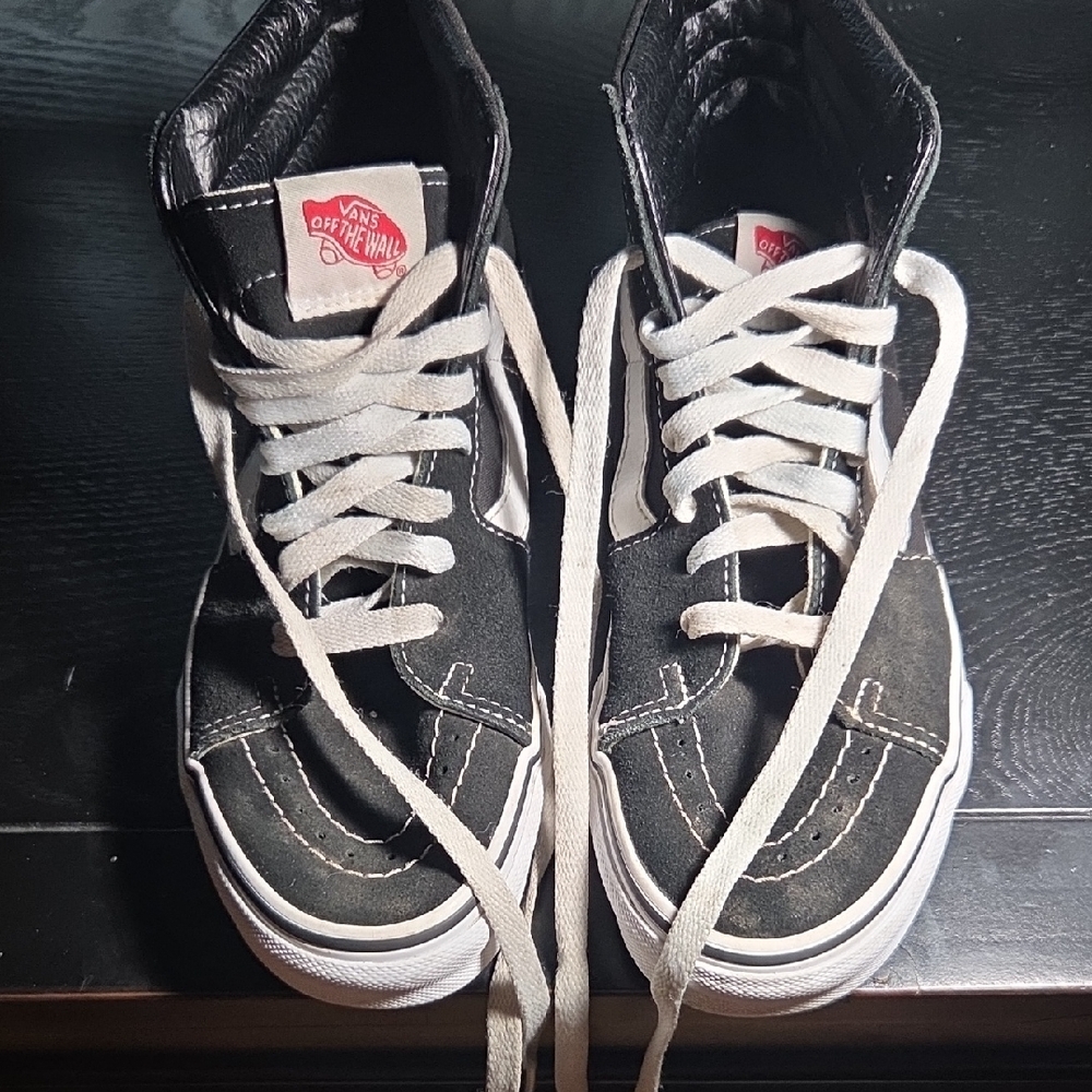 Vans Black and White Canvas Sneakers with High-Top Design